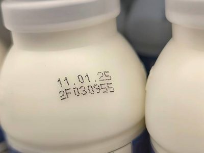 Select focus of the expiration date stamped on milk bottle. Expire date. Dairy product